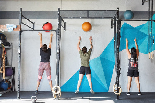 A group of people doing wall balls