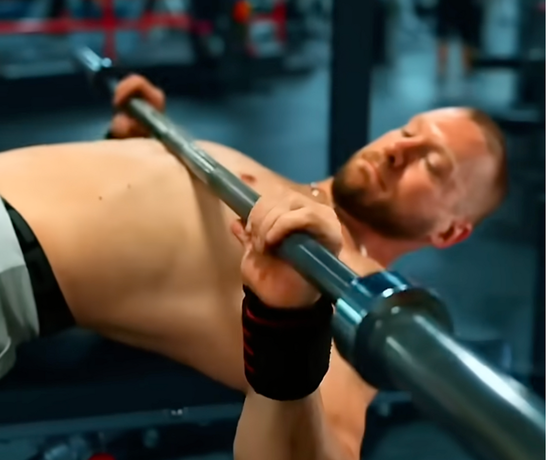 Davis Diley perfects his form for his bench press.
