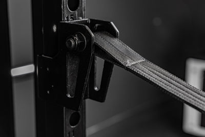 REP Fitness Altitude™ Power Rack Strap Safeties installed on the rack uprights