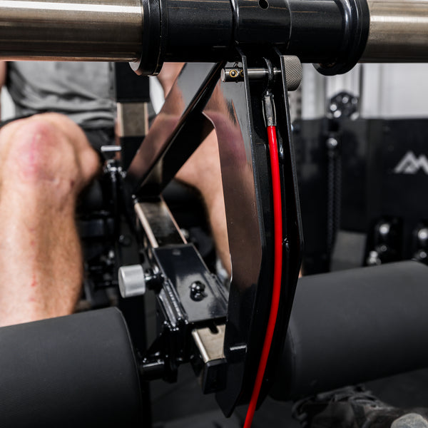 Close up shot of the cable cam on the Leg Extension & Leg Curl Bench Attachment