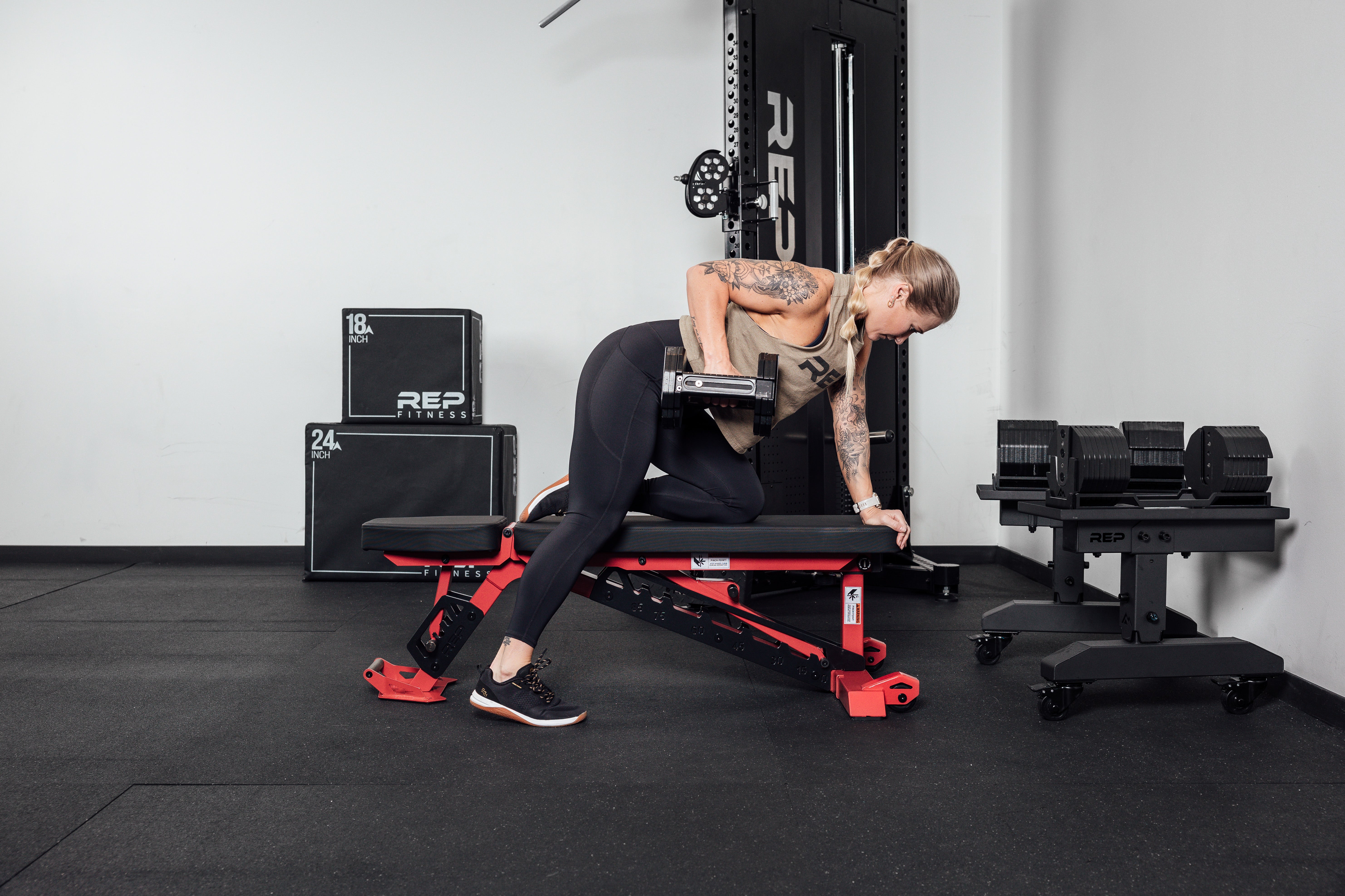 dumbbell flat rows on Nighthawk Bench