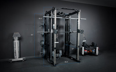 A White REP Fitness Altitude™ Power Rack in a garage home gym