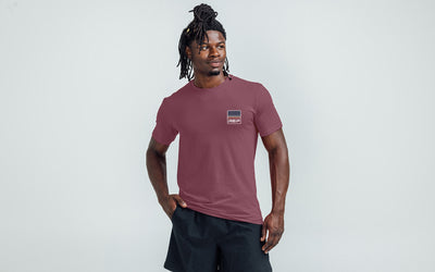 The REP Fitness Rise Tri-Blend Crew T-Shirt in Heather Maroon/Blue front, on model