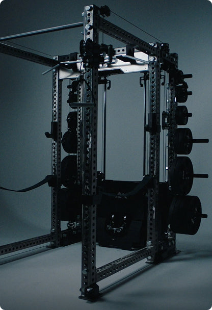 Weightlifting rack with weight plates on a dark background