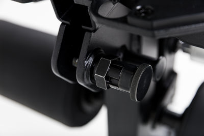 Close up of the lock-pin mechanism on the Leg Extension & Leg Curl Bench Attachment