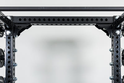 Close-Up of Compact Logo Plate Crossmember 2.0 on a REP power rack