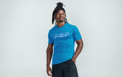 The REP Fitness Men's Blueprint Tri-Blend Crew T-shirt in Heather Royal/White front, alternate model