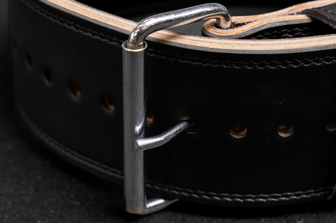 Close-Up: REP Leather Lifting Belt in Black with stainless-steel hardware and reinforced stitching