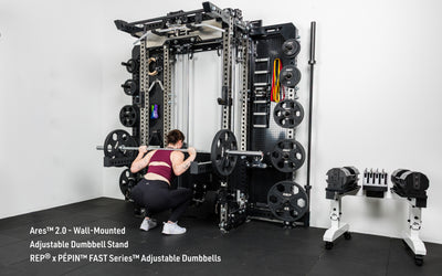 An athlete squatting off the front of the Wall-Mounted Ares 2.0
