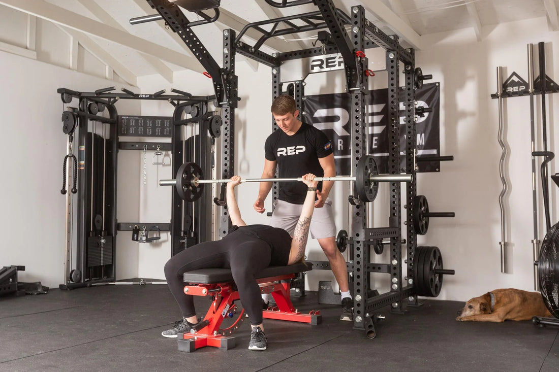 Athlete benching off the front of a PR-5000 rack in Matte Black