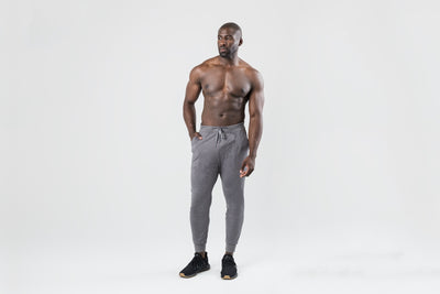 Athlete wearing the REP Fitness Men's Apollo Joggers in Heather Black, Heather Cool Gray, Heather Navy
