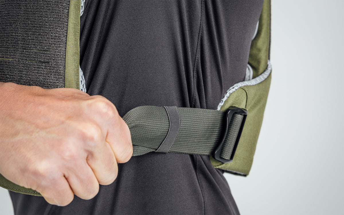 Close up of the side slide-lock hardware on the Strata Weight Vest